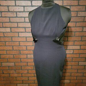 Vintage Nah Nah Collection. Black open cutouts on the sides with crisscross back
